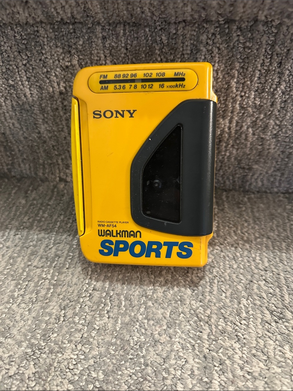 Vintage yellow Sony Walkman Sports (model WM-AF54)